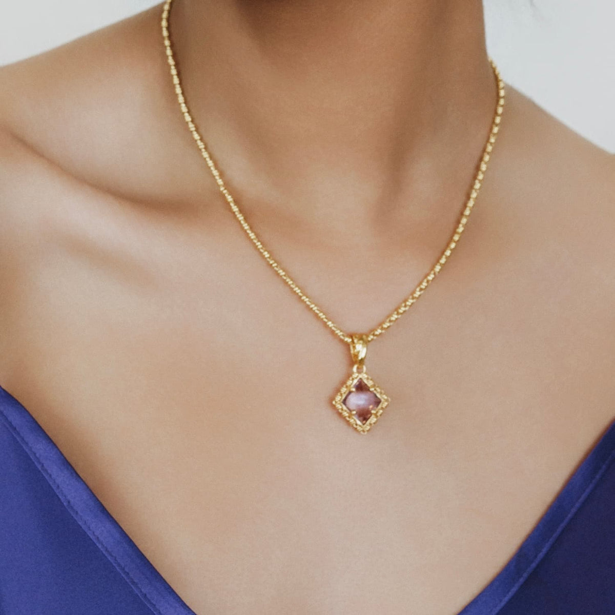 Quadra Pendant in Gold with Amethyst