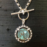 Filary Pendant in Green Patina & Silver with Bee Coin